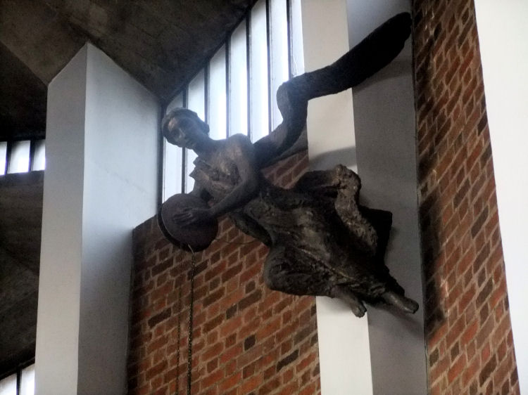 Figure of an angel carrying sanctuary lamp at  St Charles Borromeo Church, Glasgow