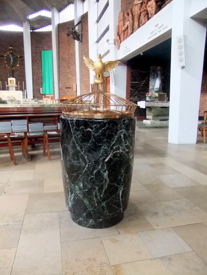 Baptismal font at  St Charles Borromeo Church formed from green Mexican Onyx