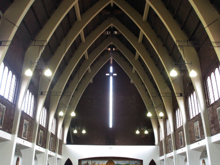 Glazed cross viewed from inside St Columba's Church