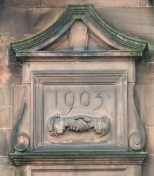 1903 plaque at Co-op tenement, Ballater Street, Gorbals