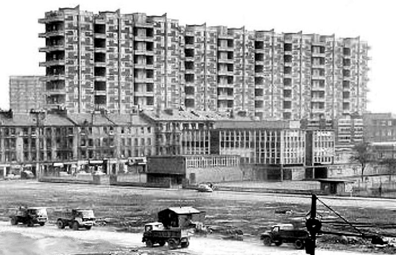 Trucks removing debris from demolished tenements in preperation for construction of Hutchesontown 'Area E'