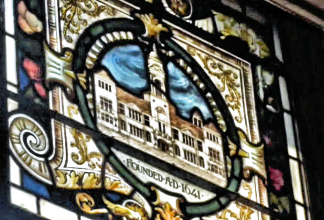 Stained glass image of of Hutchesons' Grammar School at Hutchesons' Hall