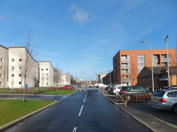 View of Abbotsford Place showing 1970's flats of Eglinton Court to the left and new flats behind Community Centre to the right