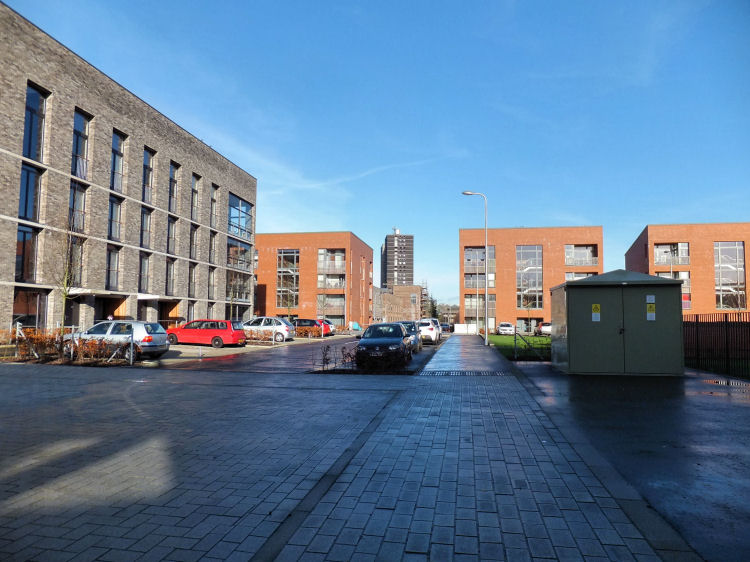 View of last surviving tower block from site of first stage of Laurieston redevelopment