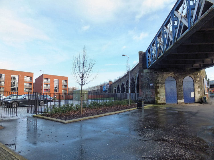 Glimpse of new development at Laurieston from under railway bridge at Cumberland Street