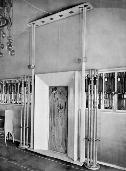 Original gesso panel flanked by matching coat stands at Salon de Luxe, Willow Tea Rooms, 1905
