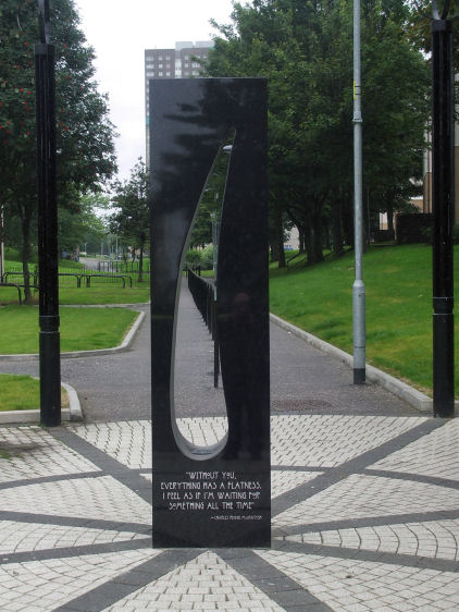 Decorative stone slab on path leading into Townhead from Buchanan Street Bus Station