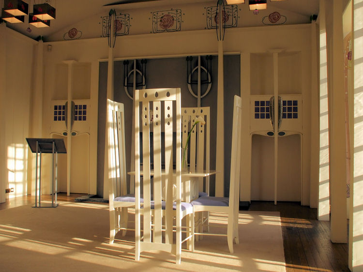 Table and chairs in Music Room at House for an Art Lover