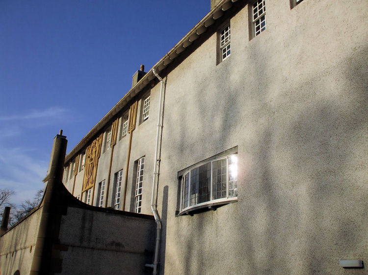 Bow window at House for an Art Lover glistening in the sunshine