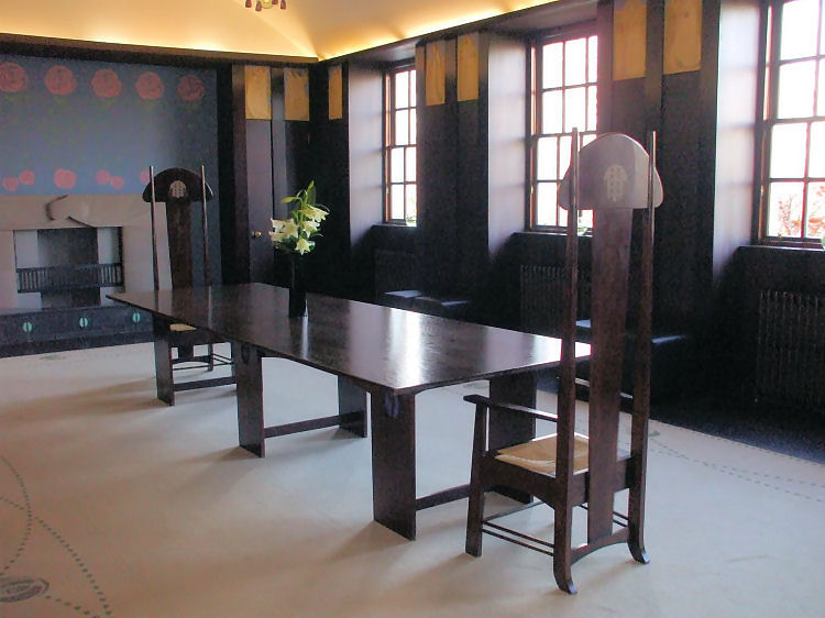 Table and chairs in Dining Room of House for an Art Lover