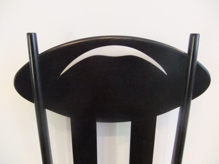 Back of Mackintosh designed chair on dispay at Lighthouse