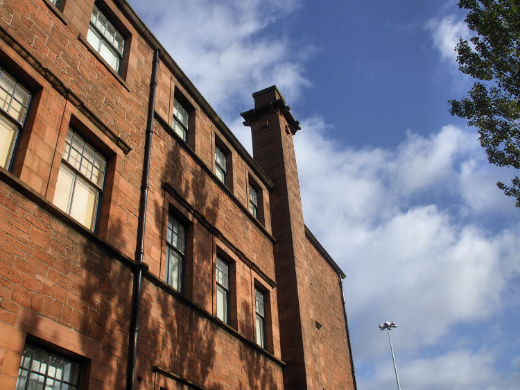 Skyward look over south-east corner of Martyrs School