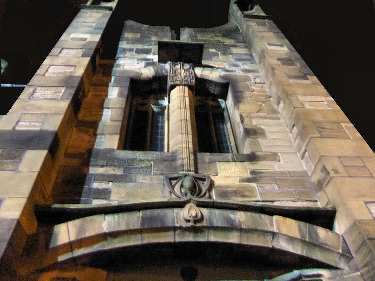 Floodlit stonework over eastern entrance of Queen's Cross Church
