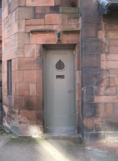 Mackintosh motif in side door of Queen's Cross Church