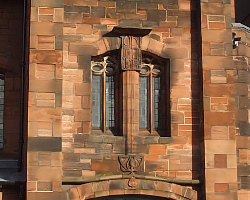 Decorated stonework around window of Queen's Cross Church 