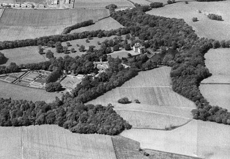 Aerial view of Castlemilk House with surrounding fields, gardens and stables, 1931