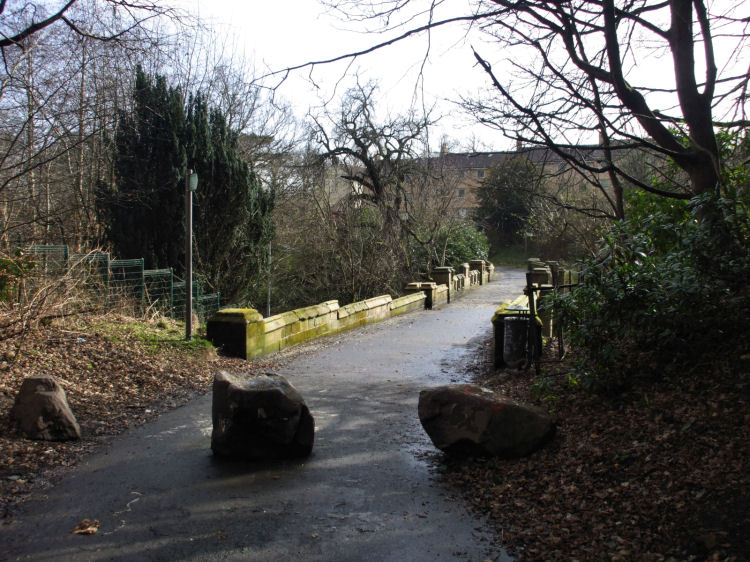Pathway across the bridge from Castlemilk Stables
