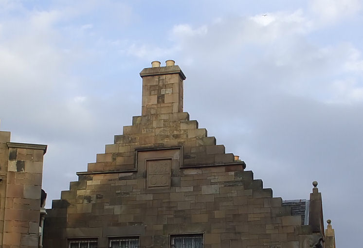 Crow-stepped gable at Cathcart Police Station with date of construction, 1892