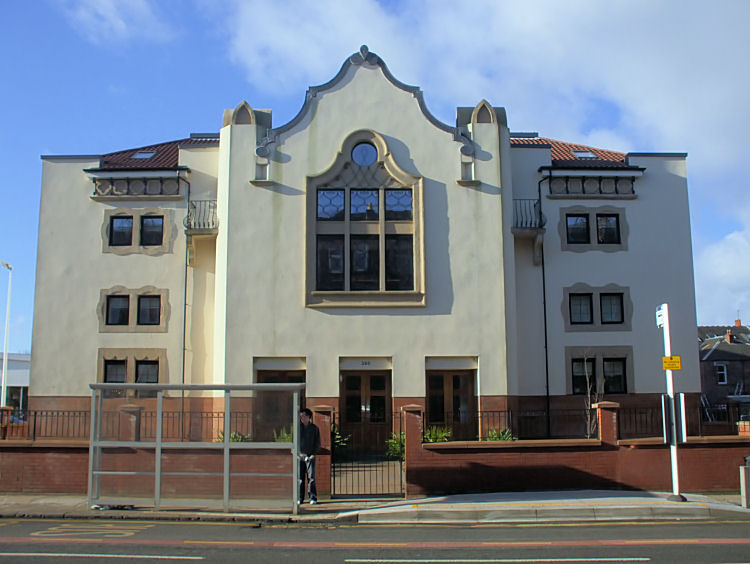 Art Deco fa�ade of former Toledo cinema, retained in front of modern apartment development