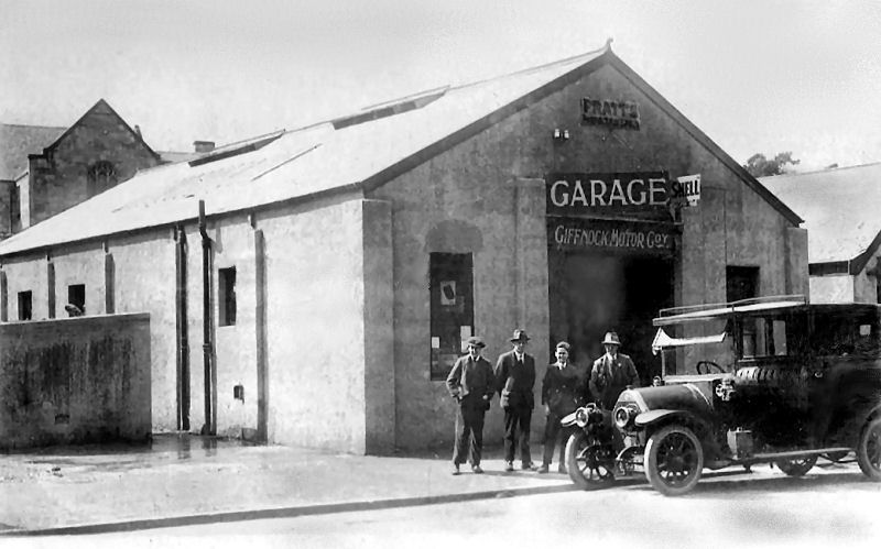 Motor car at garage of Giffnock Motor Company, Eastwood Toll