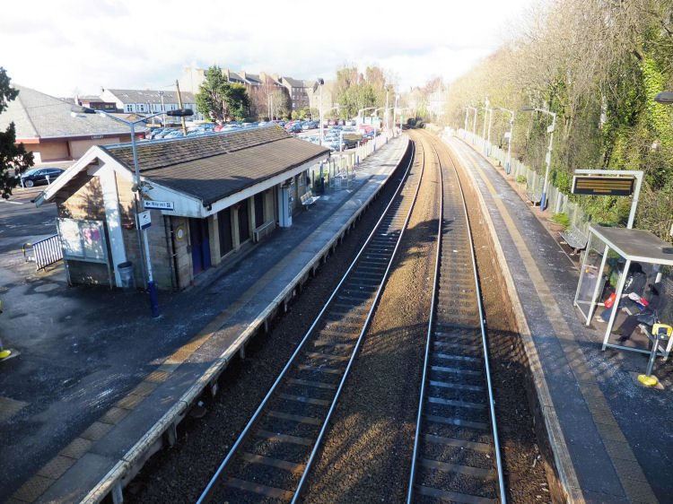 View of Giffnock Station from footbridge over railway line