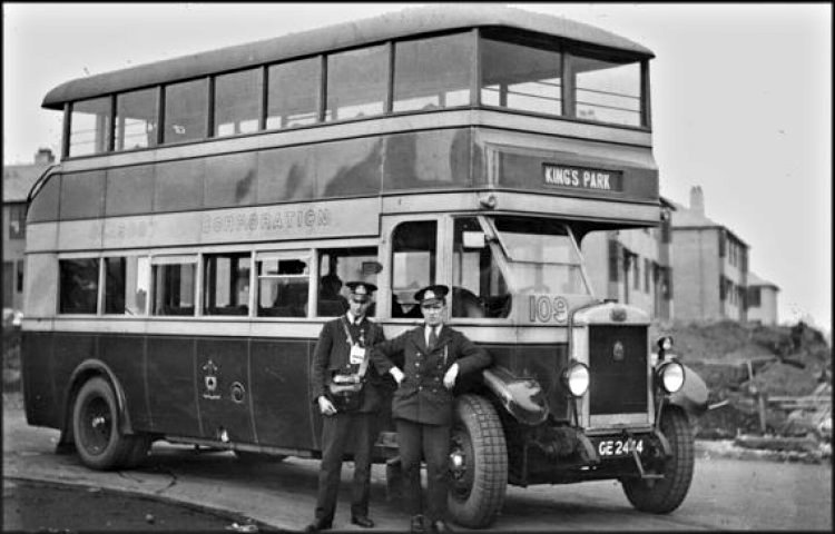 Corporation bus to King's Park at Knightswood terminus with house construction in background,  c.1930