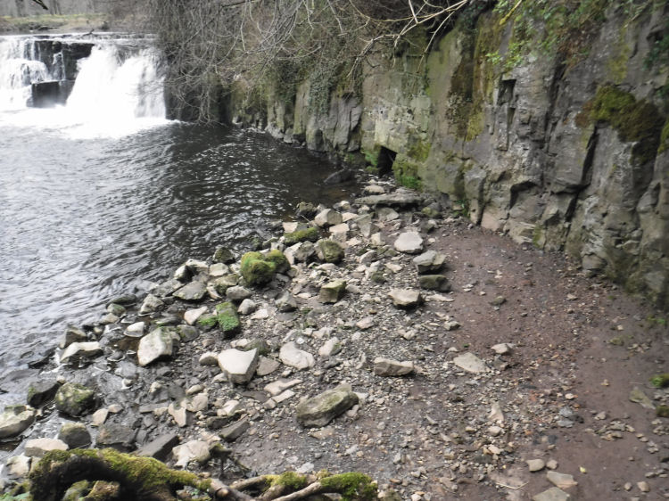 Fragments of smooth faced quarried rock resembling dressed masonry at Linn Falls