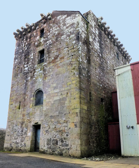 Modern view of Mearns Castle showing arched entresol entrance above cellar entrance  at ground level