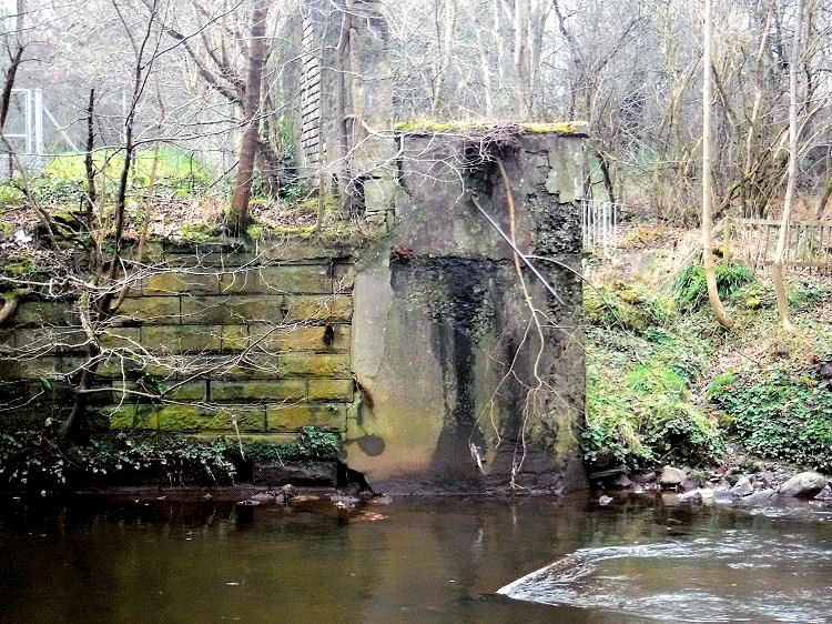 Concrete pier receiving pipe bridge at site of Netherlee Print and Dye Works