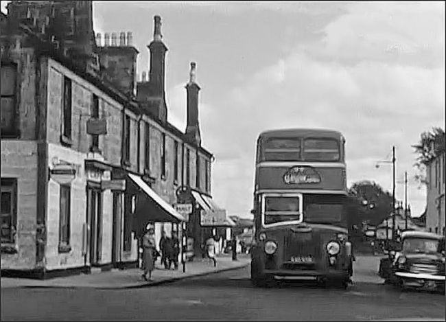Western SMT Leyland Titan bus in Barrhead Road at junction with Main Street, Newton Mearns, c.1960