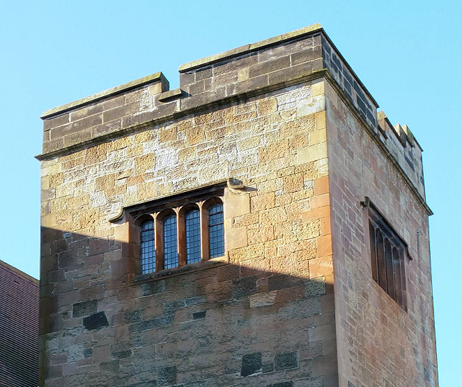 Irregular blocks of local sandstone used for the tower of Orchardhill Church, Giffnock
