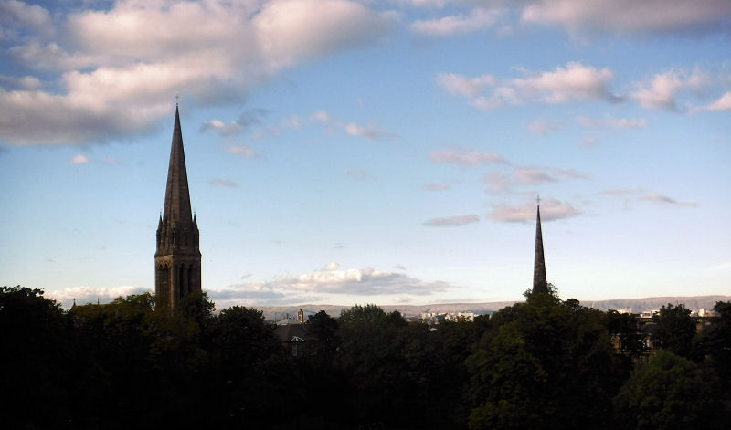 Spires of Queen's Park churches at dusk