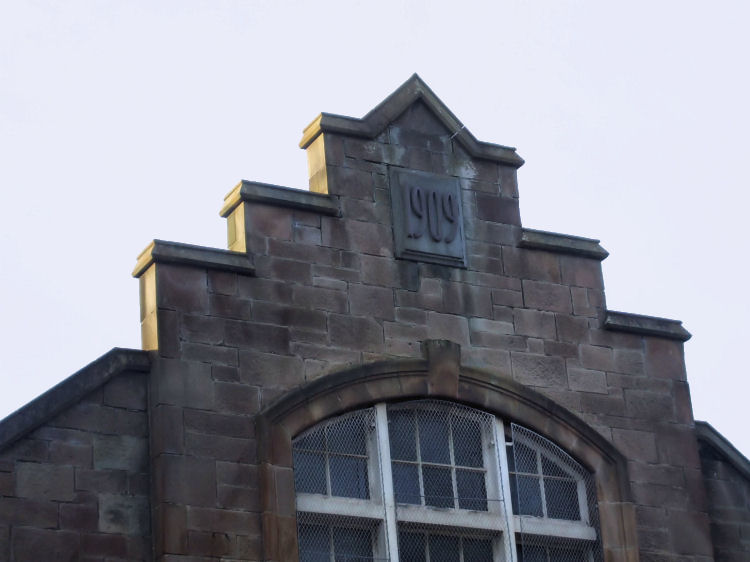 Crow-stepped fa�ade of Salvation Army Citadel with year of construction, 1909, in the stonework