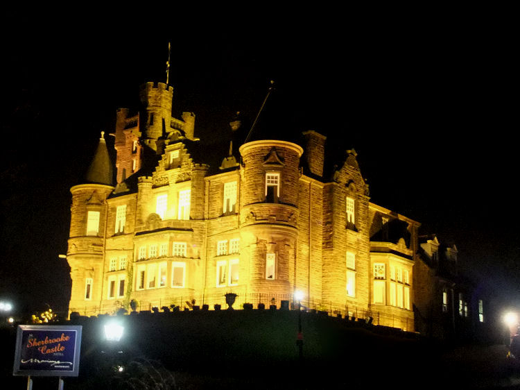 Night time view of floodlit Sherbrooke Castle Hotel