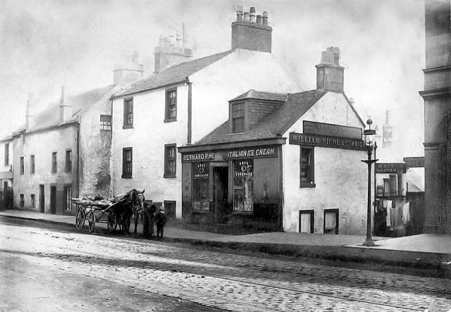 Photograph of shops and houses in Pollokshaws Road, Strathbungo, c.1900