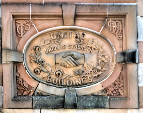 Plaque at Thornliebank Co-op tenement block