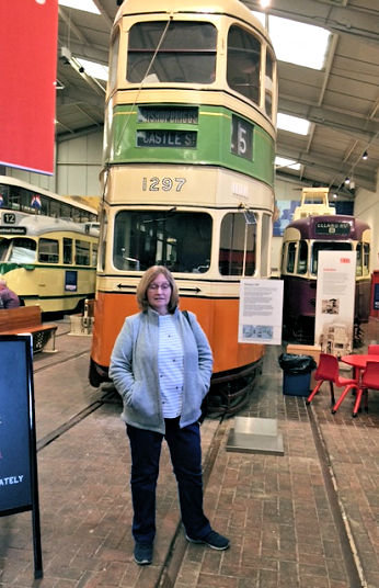 Jean Watson beside Glasgow tram No.1297 at Crich, Derbyshire, September 2019
