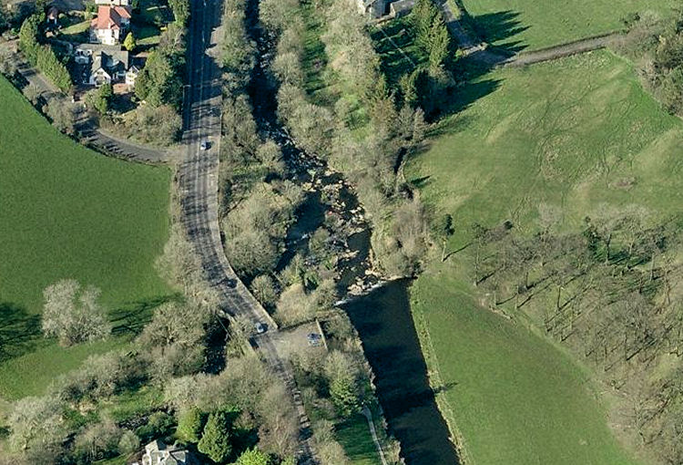 Aerial view of site of 'Mearns Mill' at the confluence of Earn Water and White Cart Water at Waterfoot