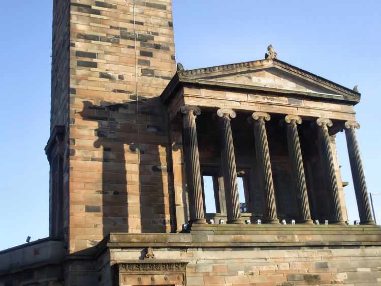 Deep shadows of portico on Caledonia Road Church