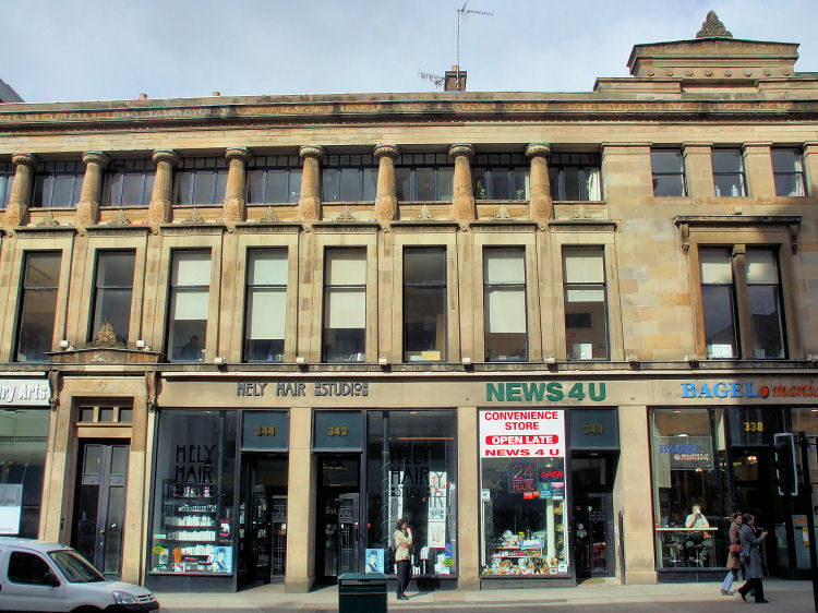 Shops at ground level at Grecian Chambers, with some Mackintosh script!