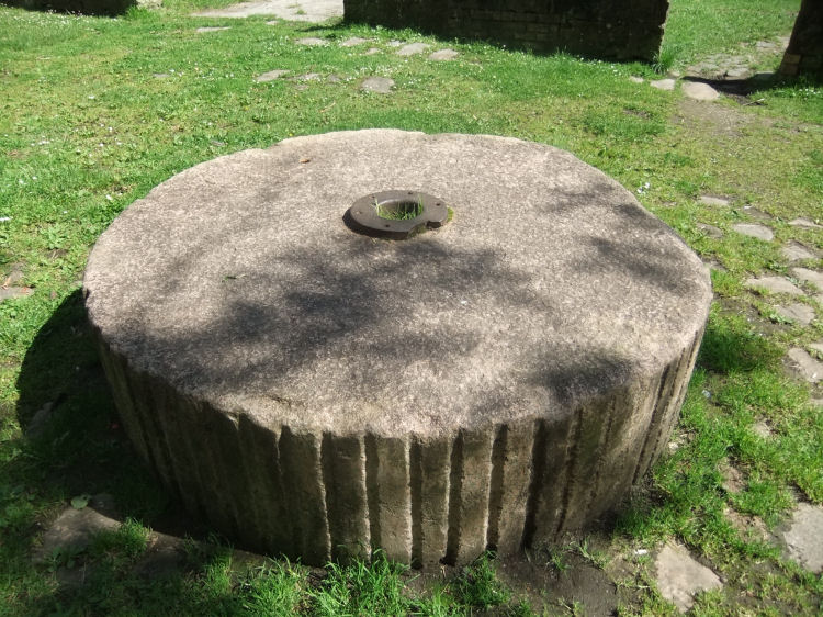 Stone grindstone at North Woodside Flint Mill