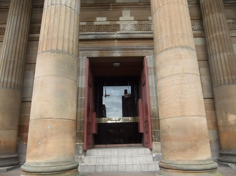 Massive columns flank the entrance to St George's in the Fields Church