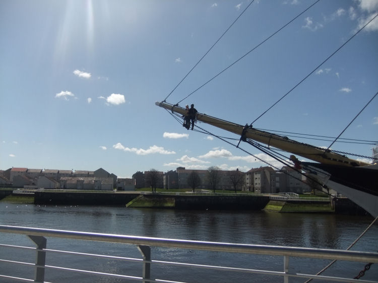Painters on tall ship on River Clyde
