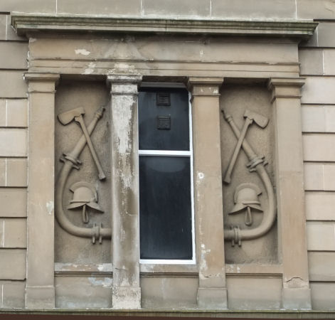 Carved relief on former fire station in St George's Road